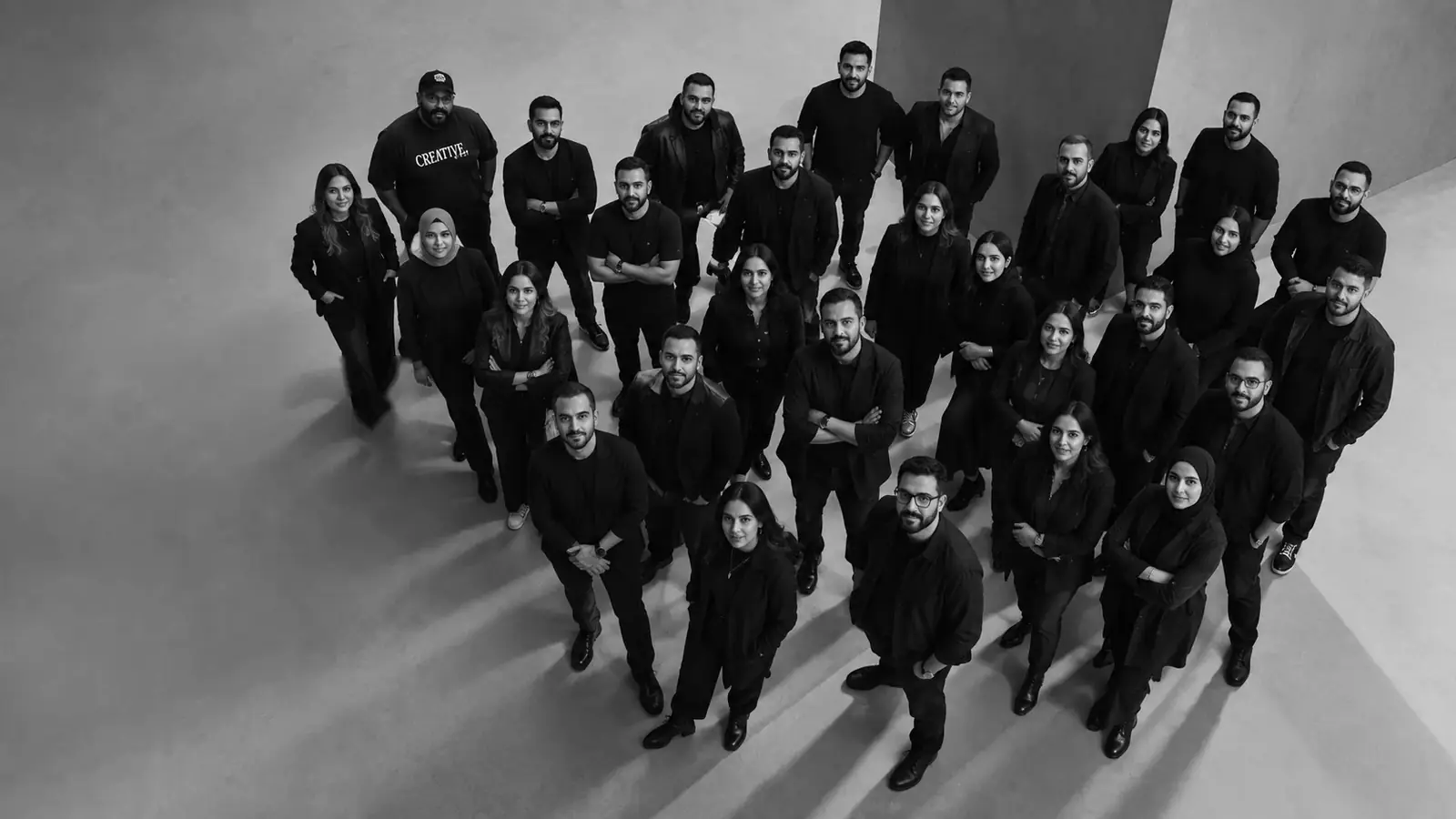 The Think Human team, photographed from above, standing together